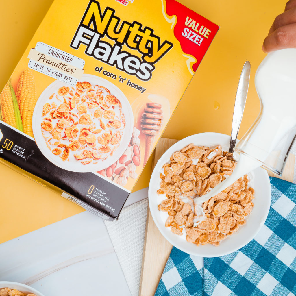 5 Sunshine Cereals_Nutty Flakes_vertical_milk pour